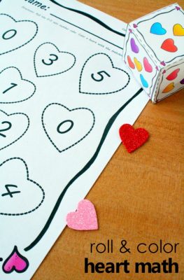Roll and color heart math counting activity for preschool and kindergarten with free printable. Hands-on Valentine's Day learning activity