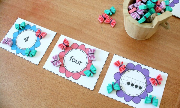 Using tiny erasers for math with free printable flower number cards