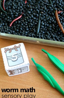 worm math sensory play with free printable number cubes. Perfect for preschool worm theme!