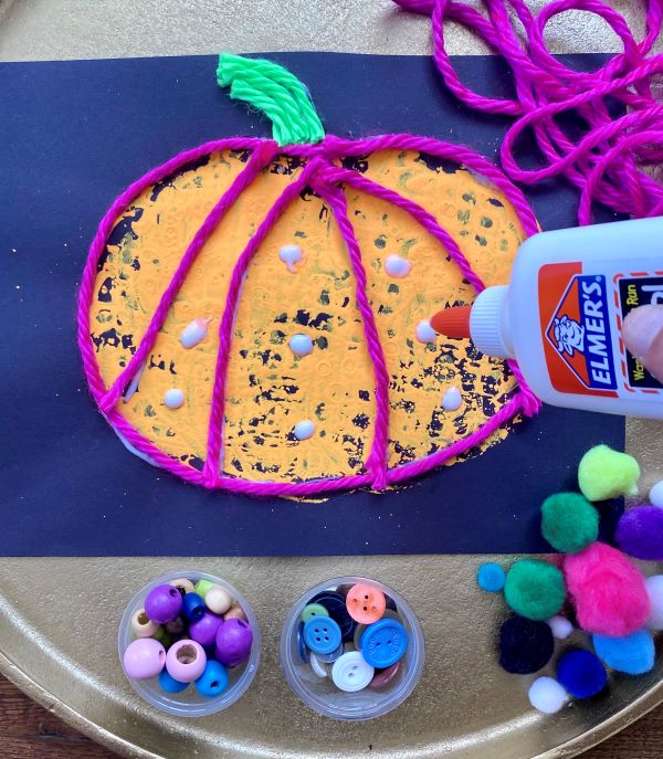 How to Make Halloween Art Project-Embellish pumpkins with loose parts and craft supplies